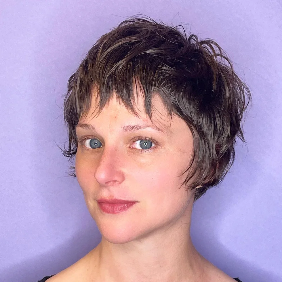 ear straight chestnut pixie with side swept fringe shown as a baby bangs idea, featuring side part