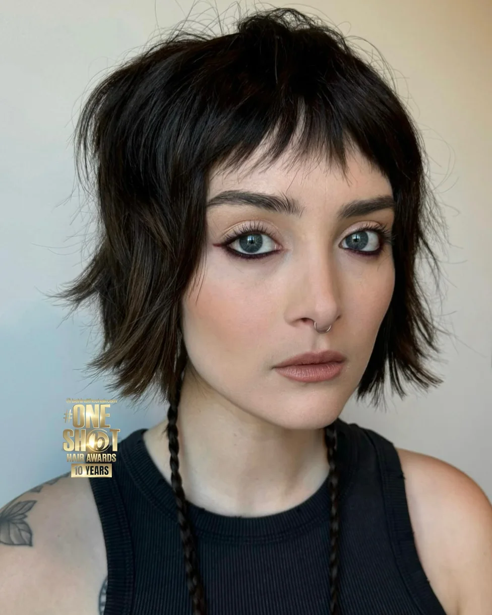 shoulder wavy chestnut shag with curtain fringe shown as a baby bangs idea, featuring heavy layering