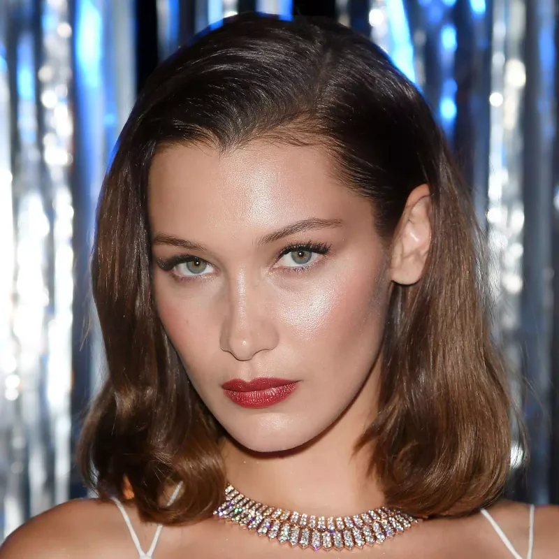 Brown shoulder-skimming bob with soft bends