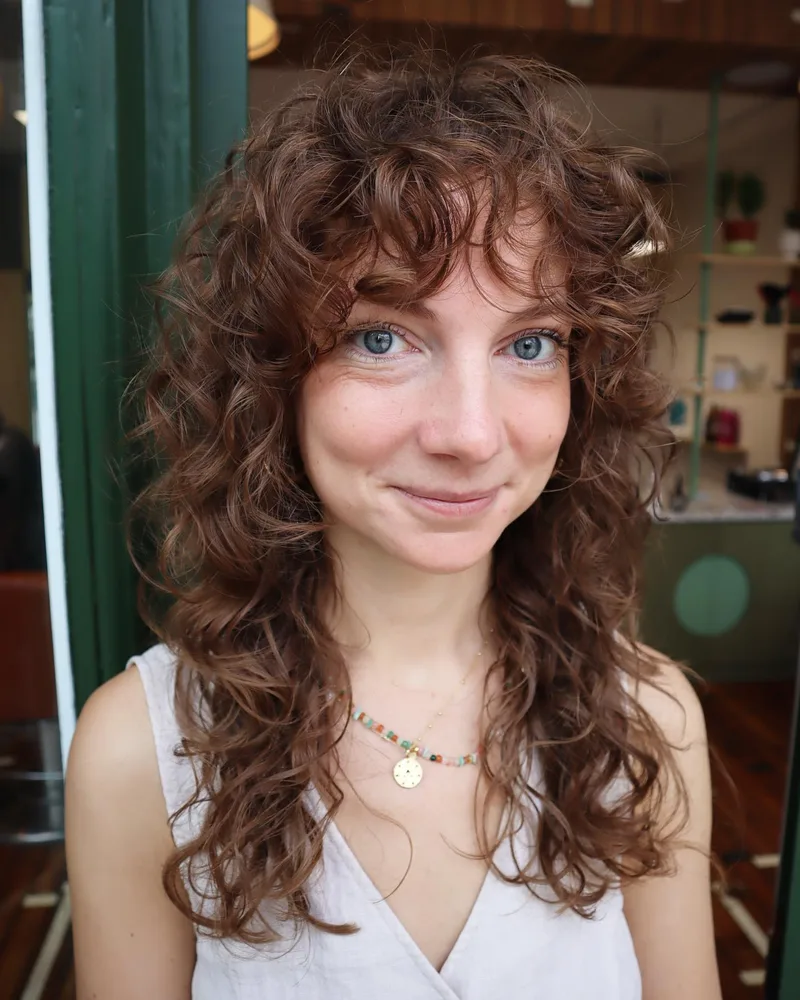 Long brown curls with a fringe