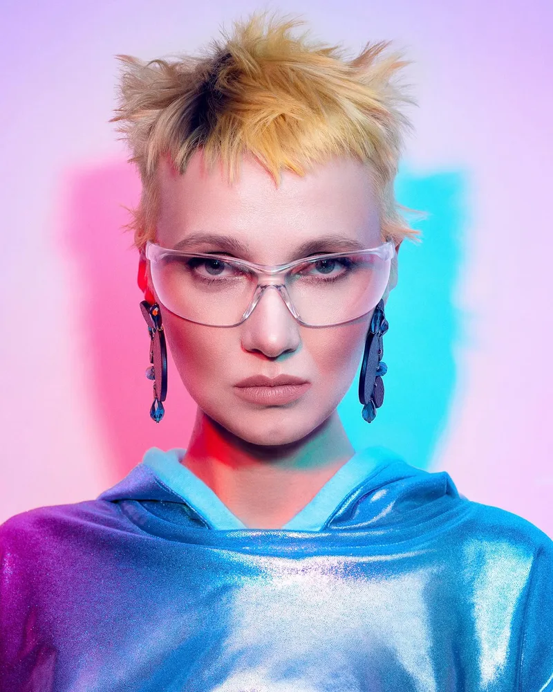 Short blonde cropped hairstyle with a lifted spiky top and close sides