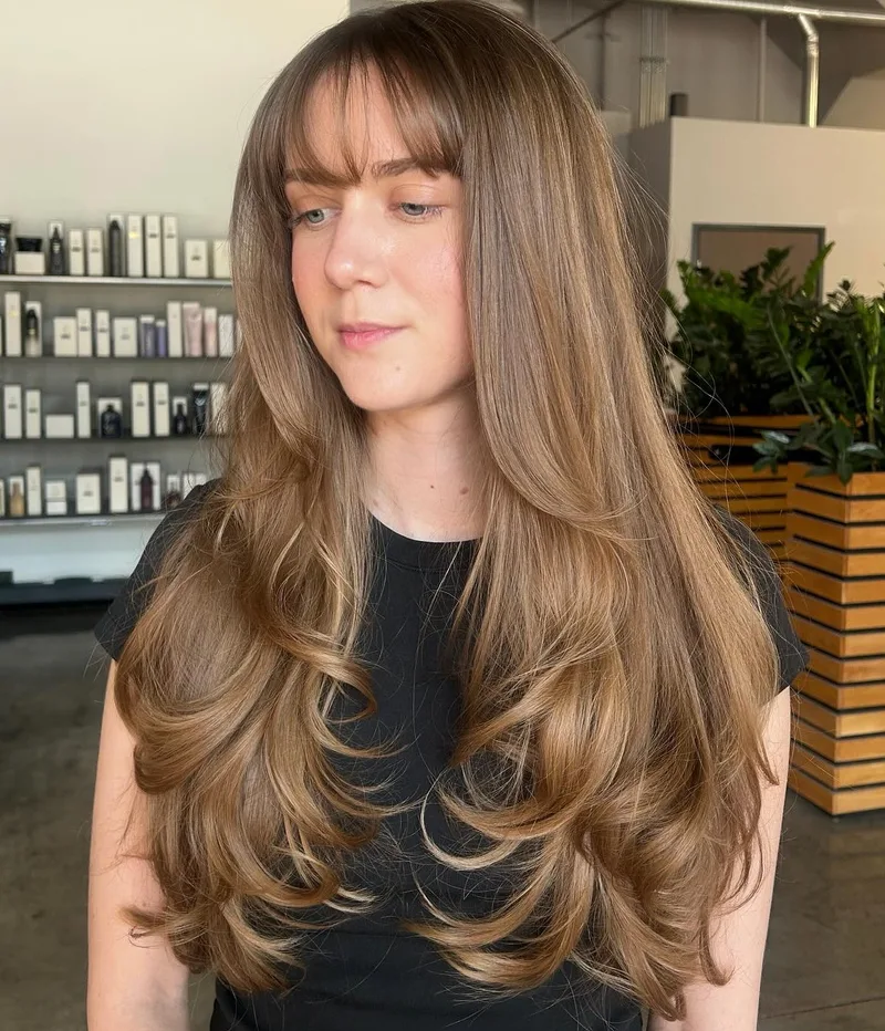 Layered blowout with a softly shaped fringe