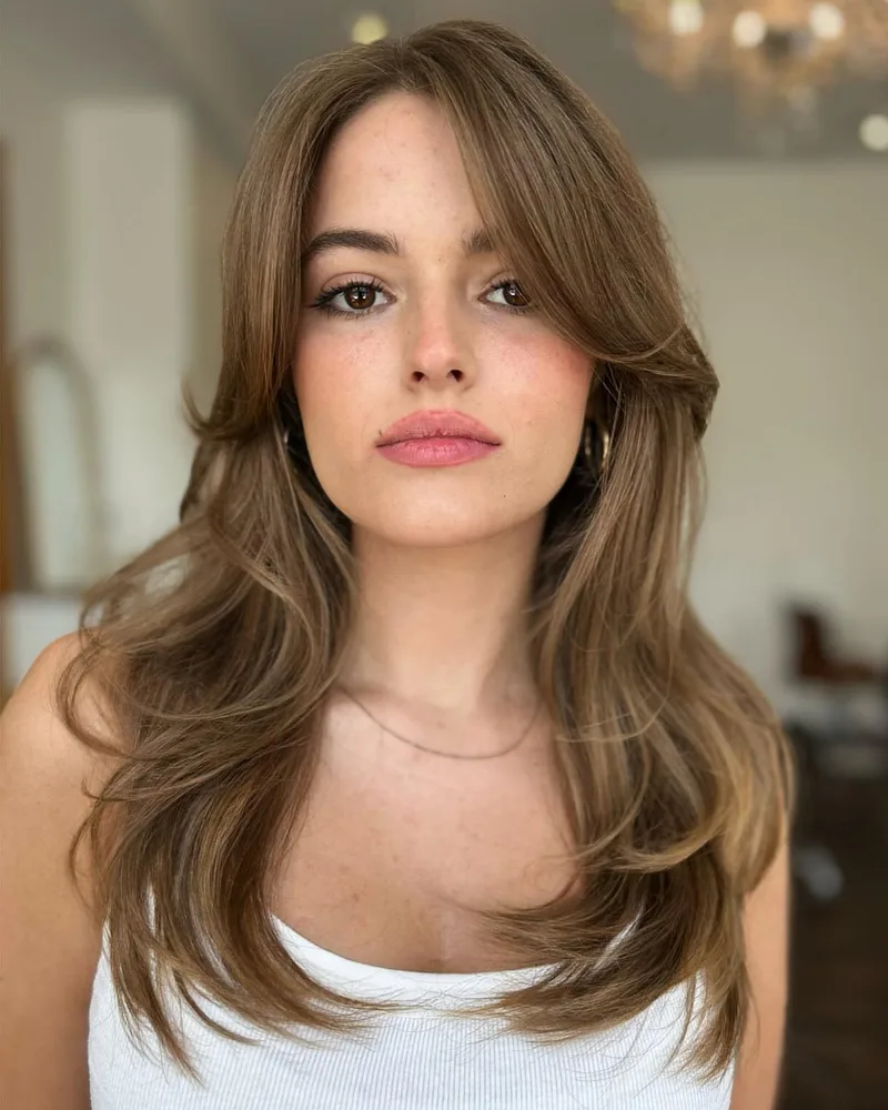 Long curtain layers with a rounded blowout shape