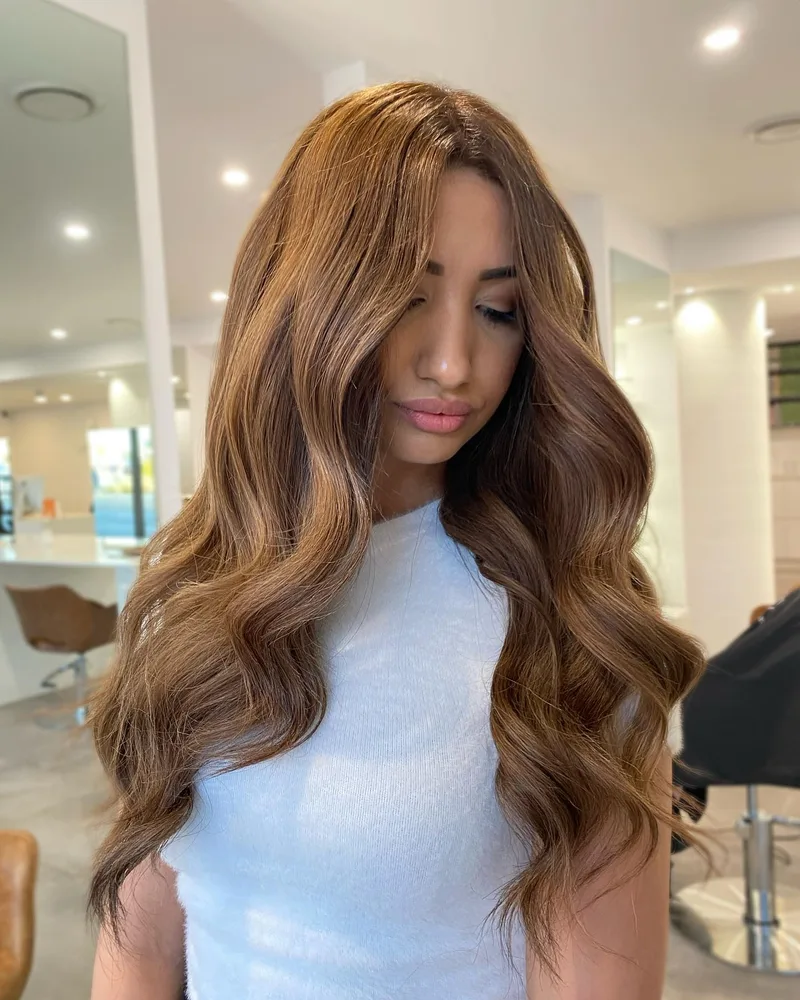 Long brown curls with layered movement
