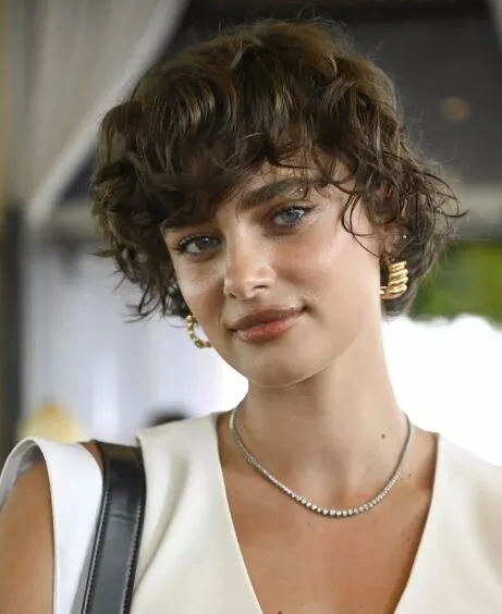 ear straight chestnut undercut with side swept fringe shown as a bixie haircut idea