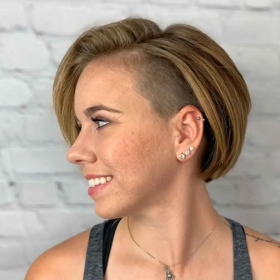 ear straight chestnut undercut shown as a bixie haircut idea