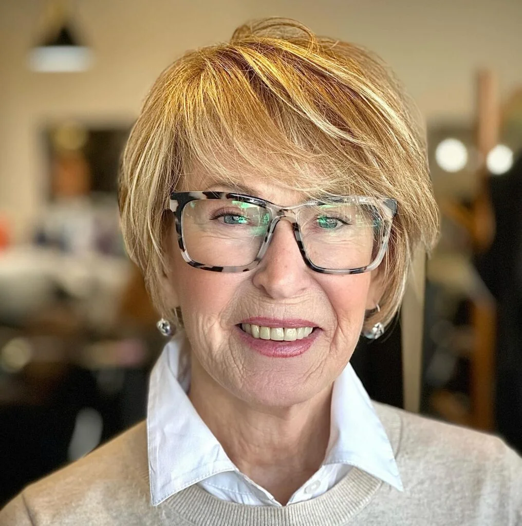 Blonde chin bob with glasses and soft side bangs