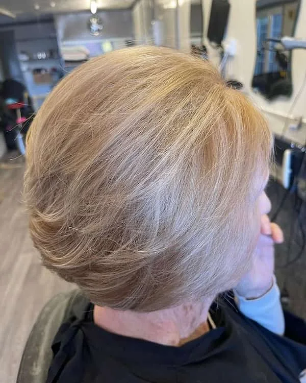 Back view of a blonde rounded bob with soft crown volume