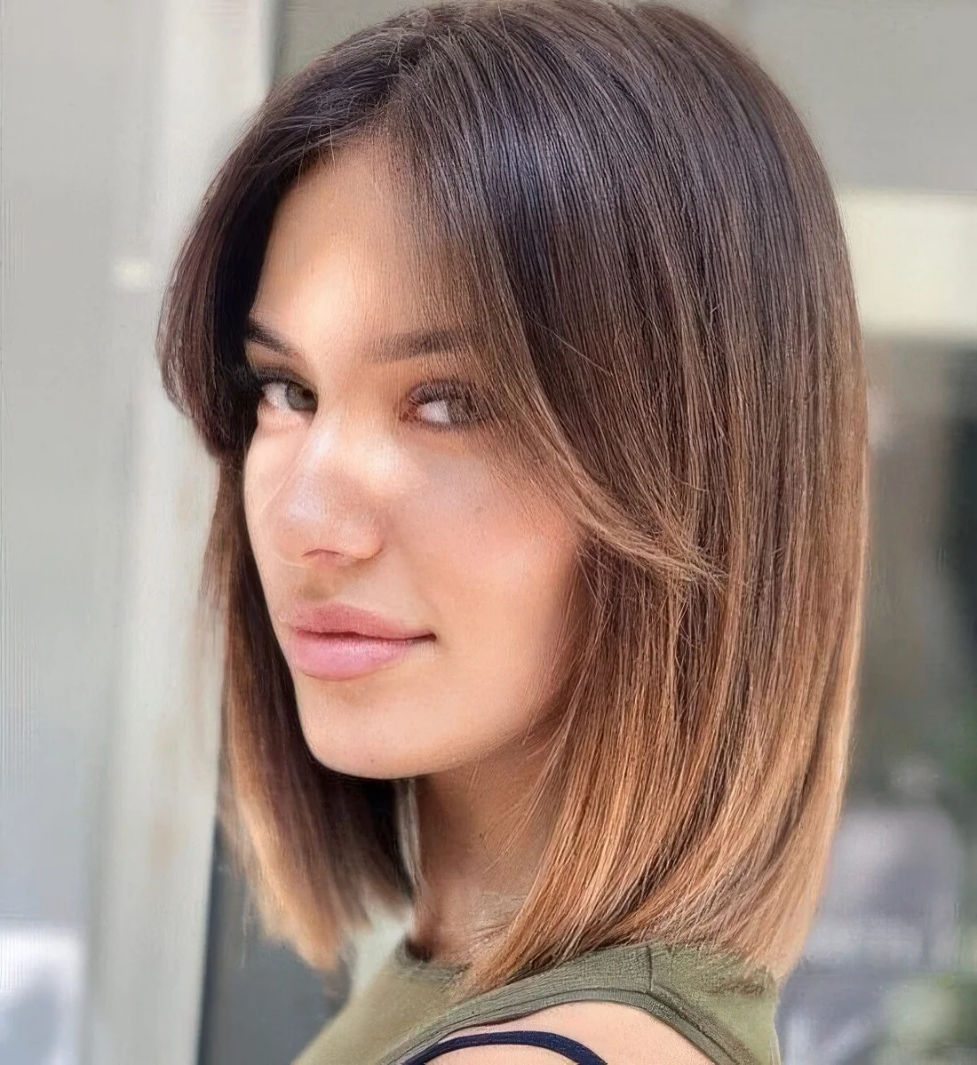 Photo showing long bob hairstyle, with the hairstyle clearly visible.