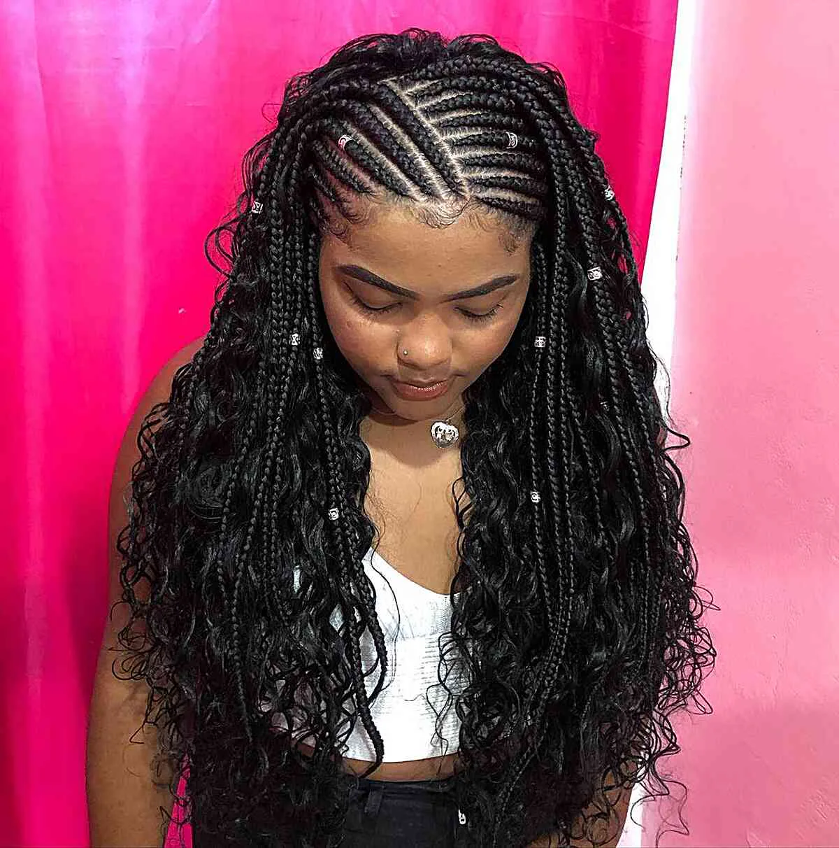 chest braids black knotless shown as a box braids hairstyles styling ideas idea, featuring chest outline, shown in black woman cornrows with curly ends