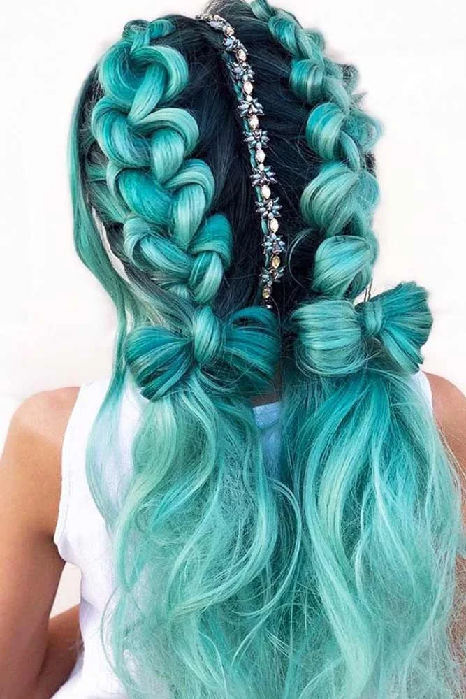 Back view of turquoise twin braids with a narrow sparkling center accent