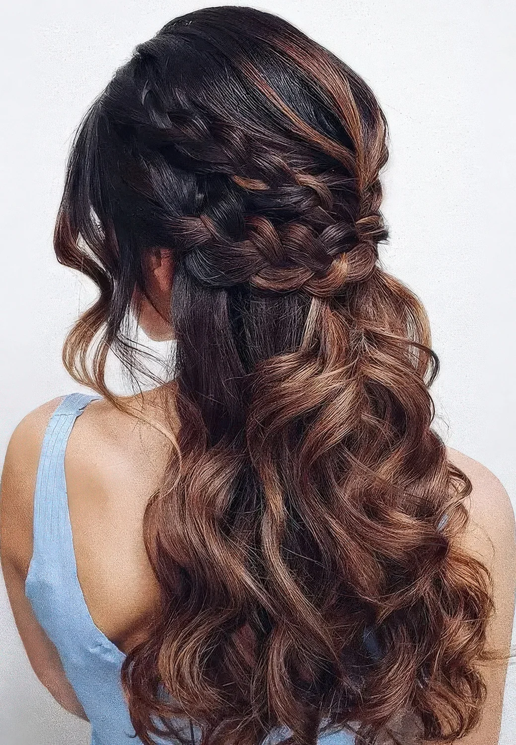 Boho half updo with a double braided halo and waves down, waves framing the face and caramel balayage that.
