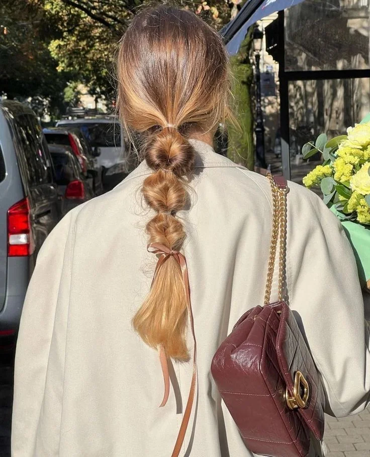 chest straight chestnut ponytail shown as a bubble braid ponytail hairstyles idea
