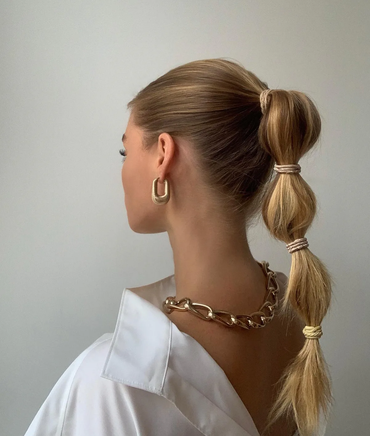 chest straight blonde ponytail shown as a bubble braid ponytail hairstyles idea