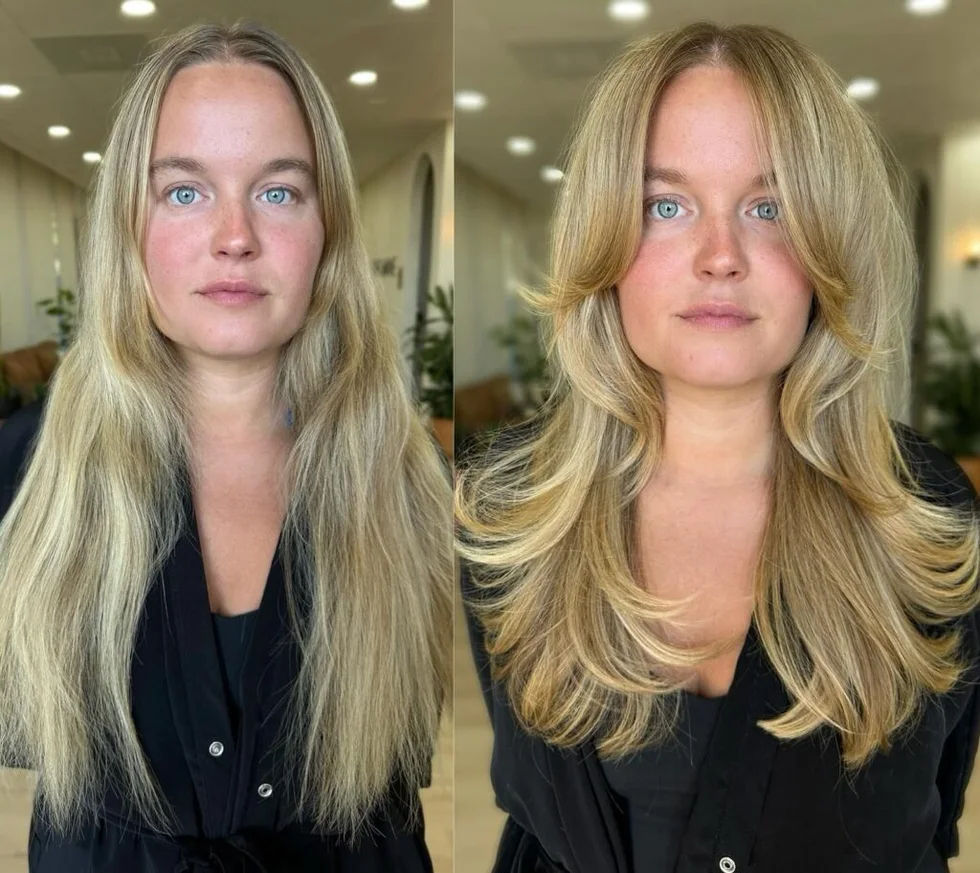 Blonde butterfly haircut with dark roots and long layers