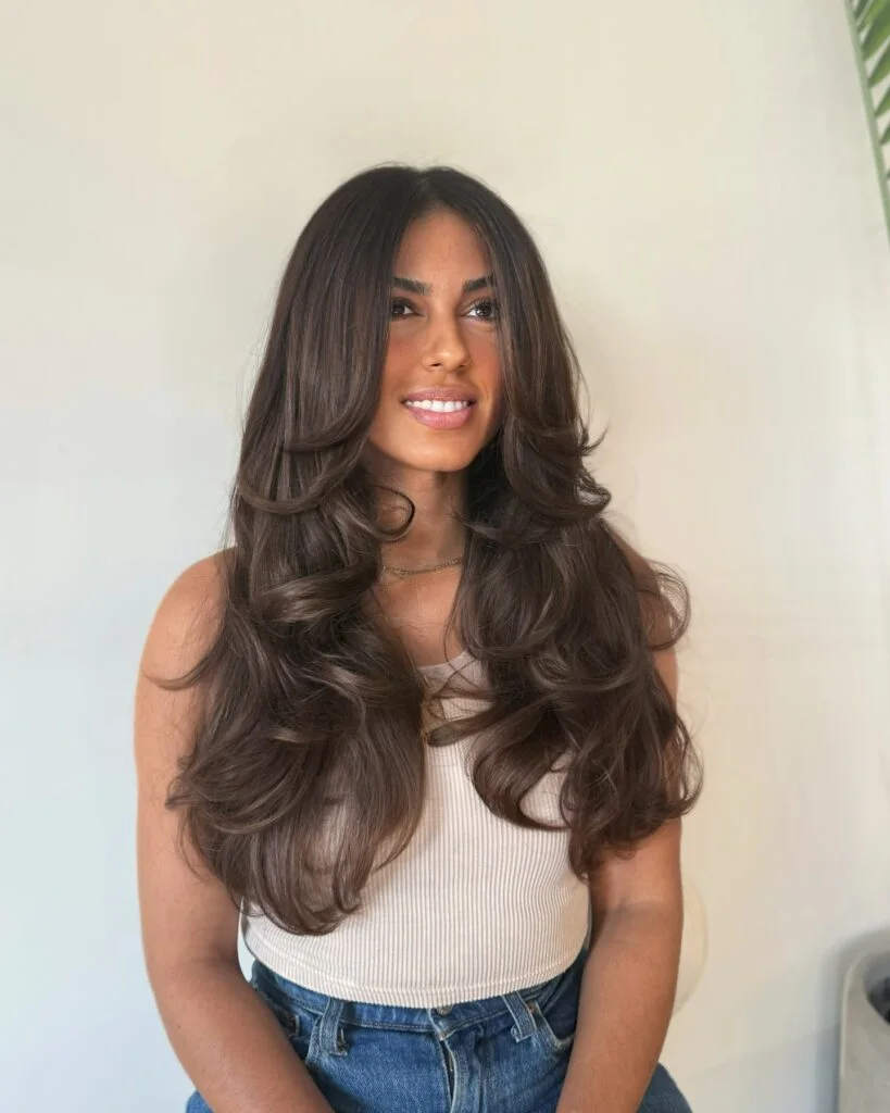 Long espresso butterfly haircut with full flowing layers