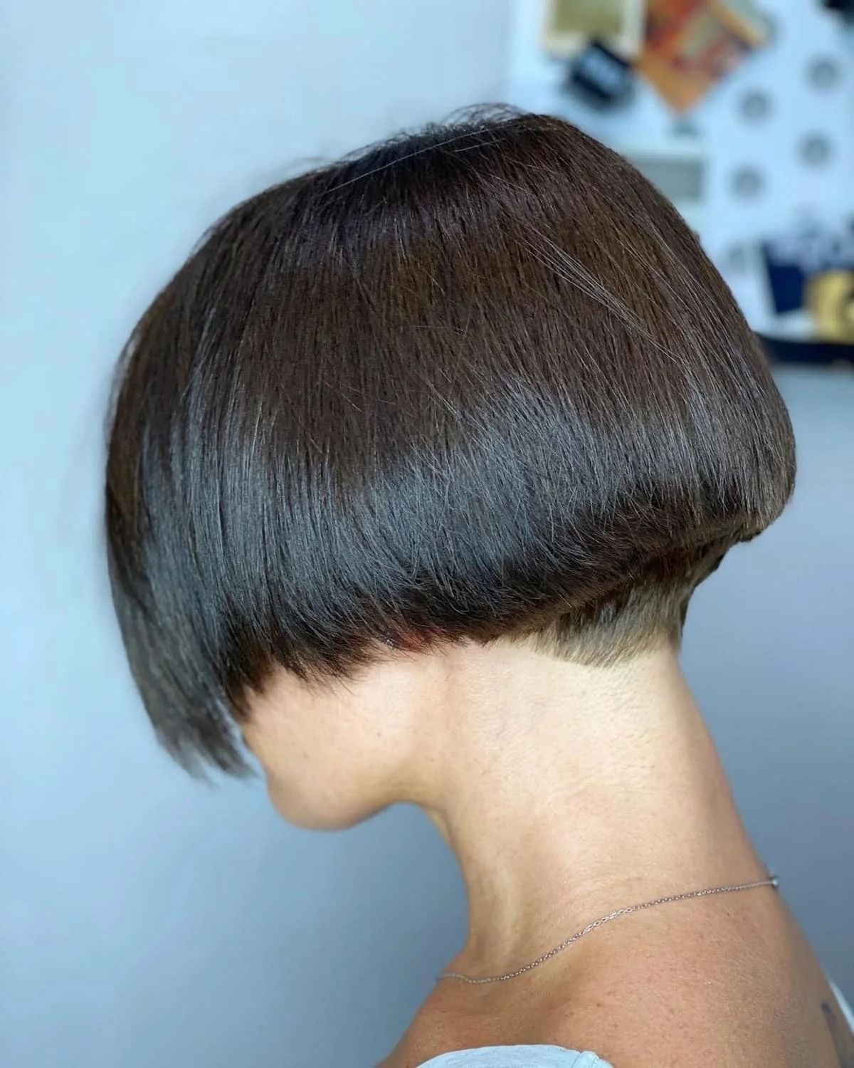 Undercut choppy bowl bob for fine hair with a sharp neck-length shape
