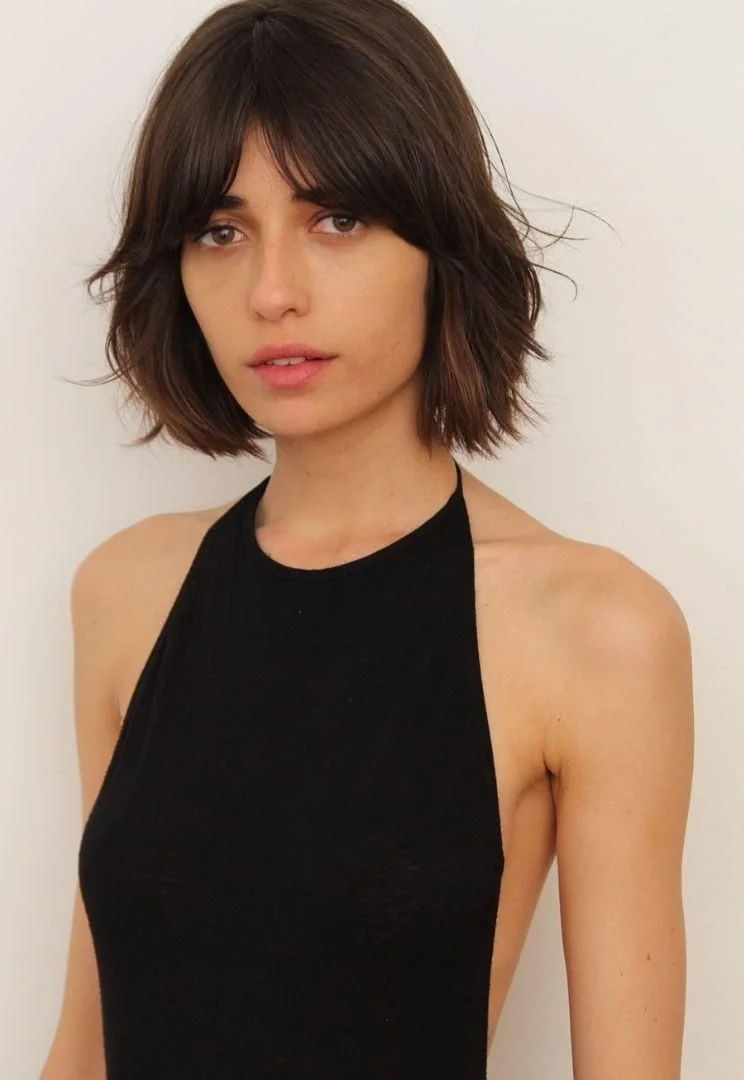 Piecey chin-length choppy bob for fine hair with curtain bangs