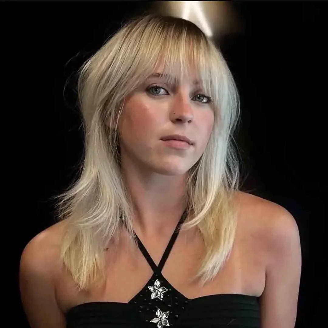 Platinum choppy lob bob for fine hair with long curtain bangs
