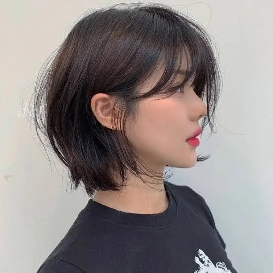 Side view black choppy bob for fine hair with airy wispy layers