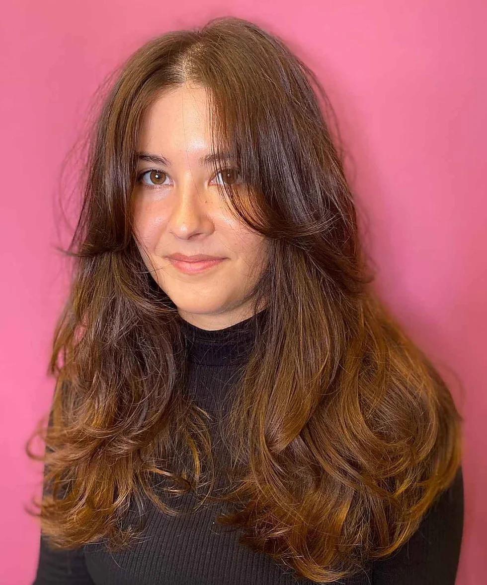 long wavy caramel layers with curtain fringe shown as a dark brown color ideas idea