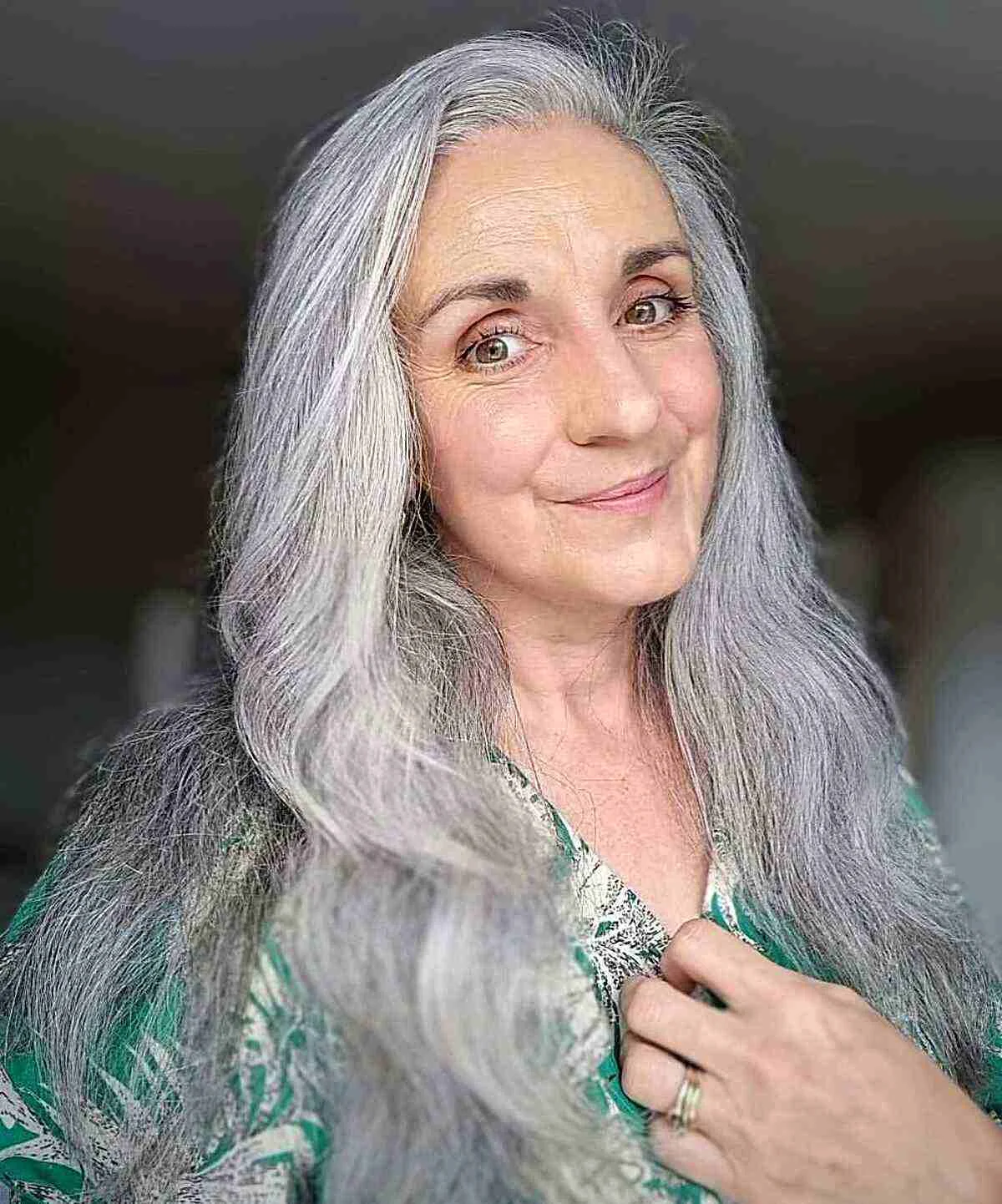 chest wavy gray layers shown as a gray blending for older women idea, featuring natural finish