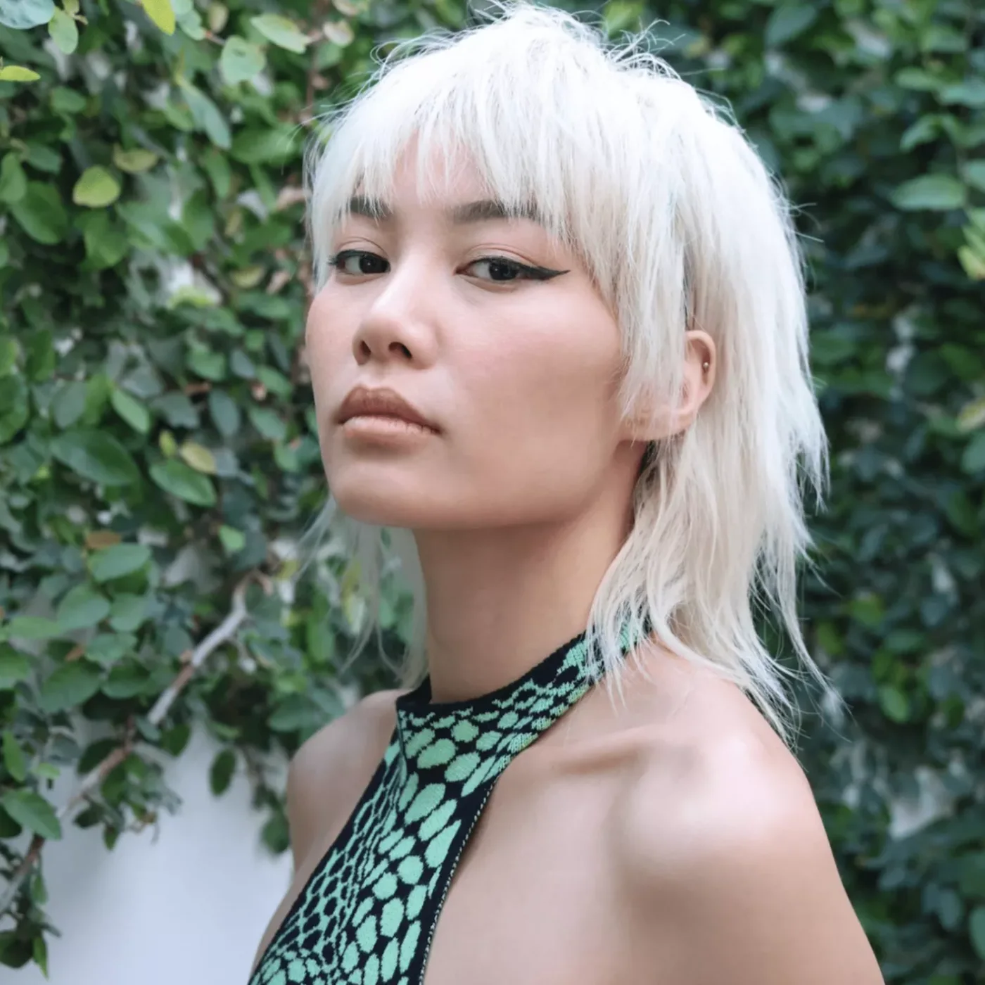 white shag with choppy layers showing blonde short hair with straight texture for thin fine hair
