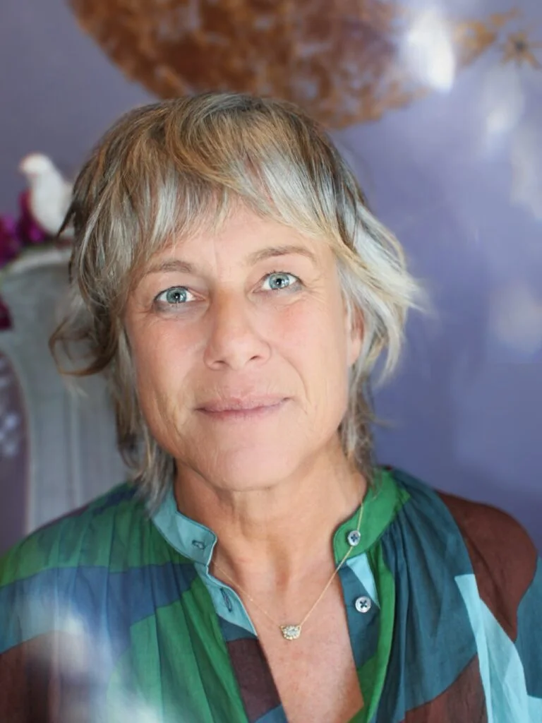 soft gray pixie shag showing blonde short hair with wavy texture for thin fine hair