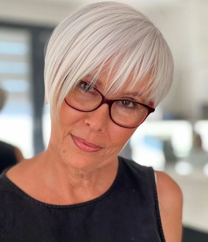 sleek silver pixie bob showing blonde short hair with straight texture for thin fine hair