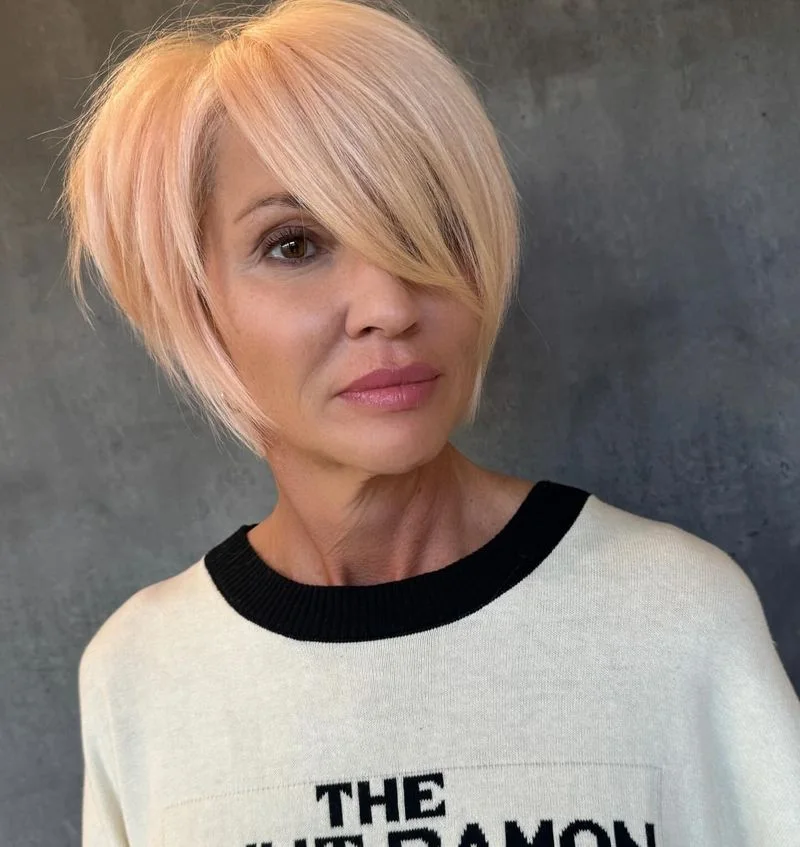 long blonde pixie bob showing blonde short hair with straight texture for thin fine hair