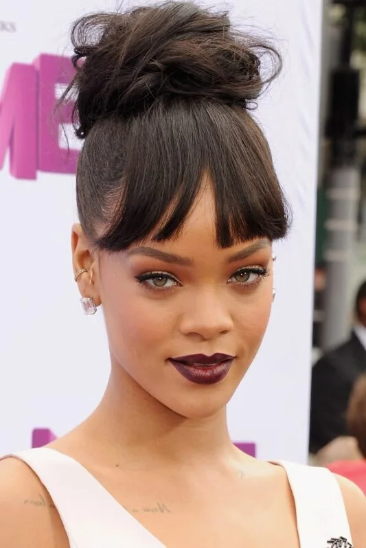 medium straight black updo with micro fringe shown as a hairstyles for going out idea