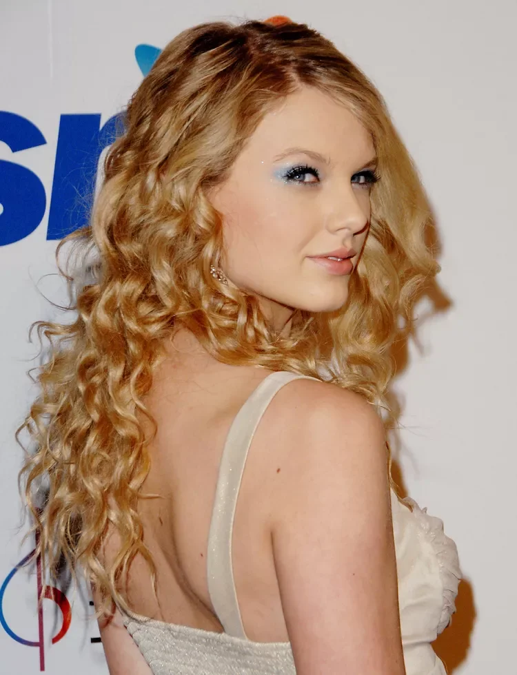 chest curly golden curly style shown as a hairstyles for going out idea