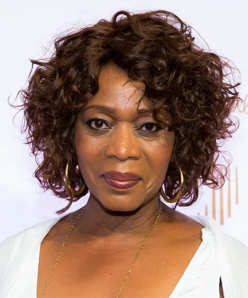 Curly black shag with curly fringe and medium textured layers