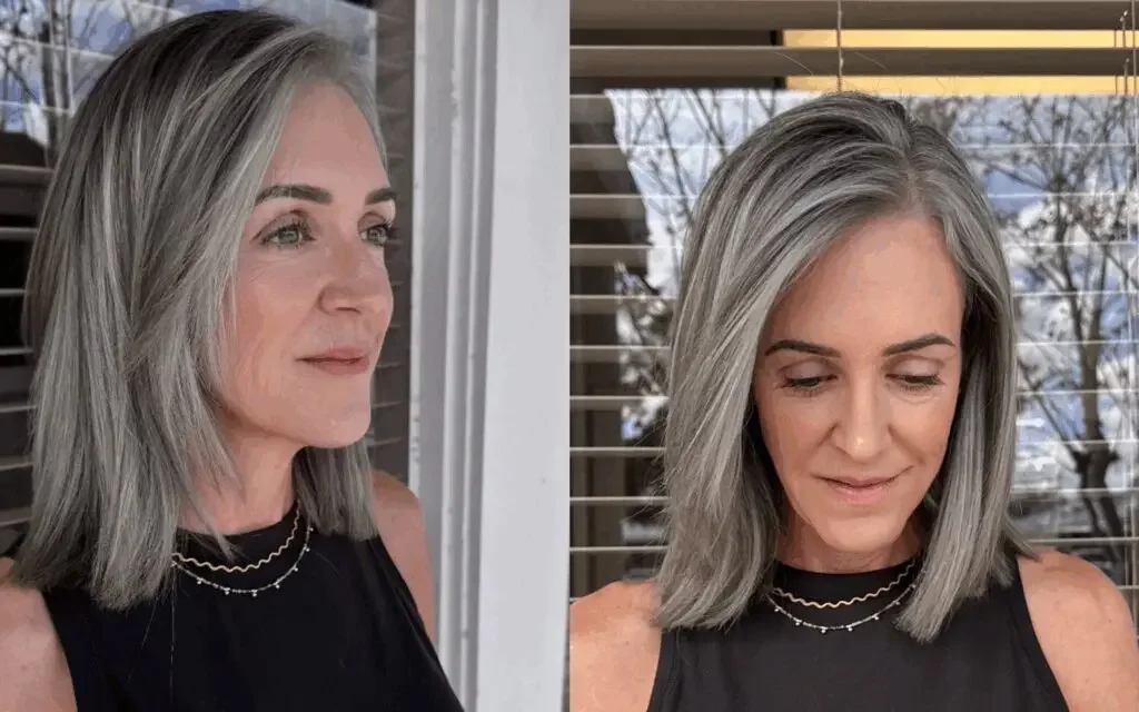 A smooth silver bob with glasses, neat side pieces, and a fuller rounded outline. This hairstyle is shown as inspiration for women over 60 with thin hair.