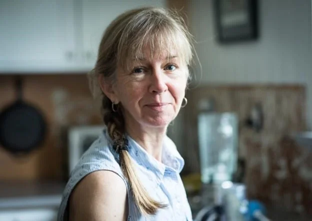 chest straight ash braid with wispy fringe shown as a hairstyles for women over 60 idea