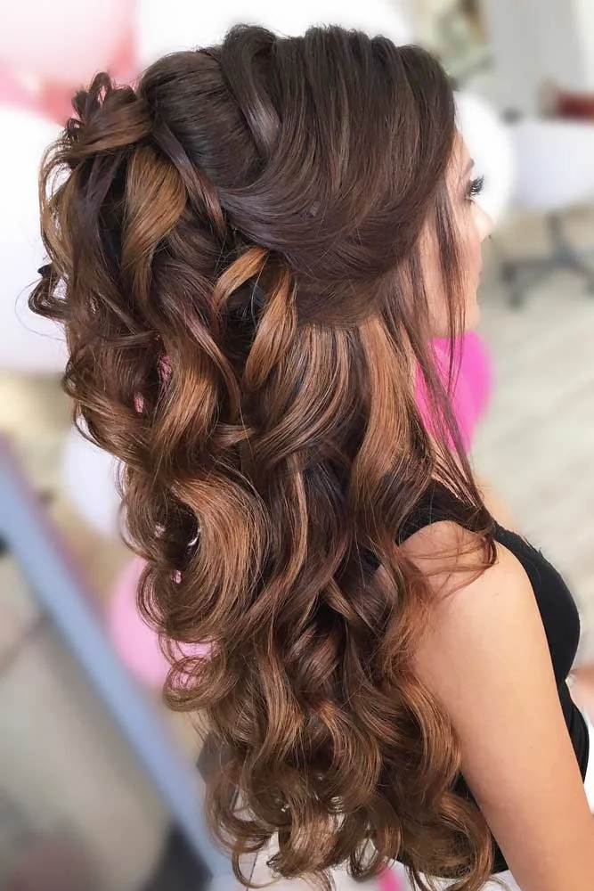 Brown half-up hair with a softly lifted crown and long loose curls