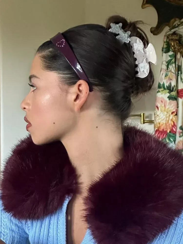 chest straight black bun shown as a headband hairstyles idea