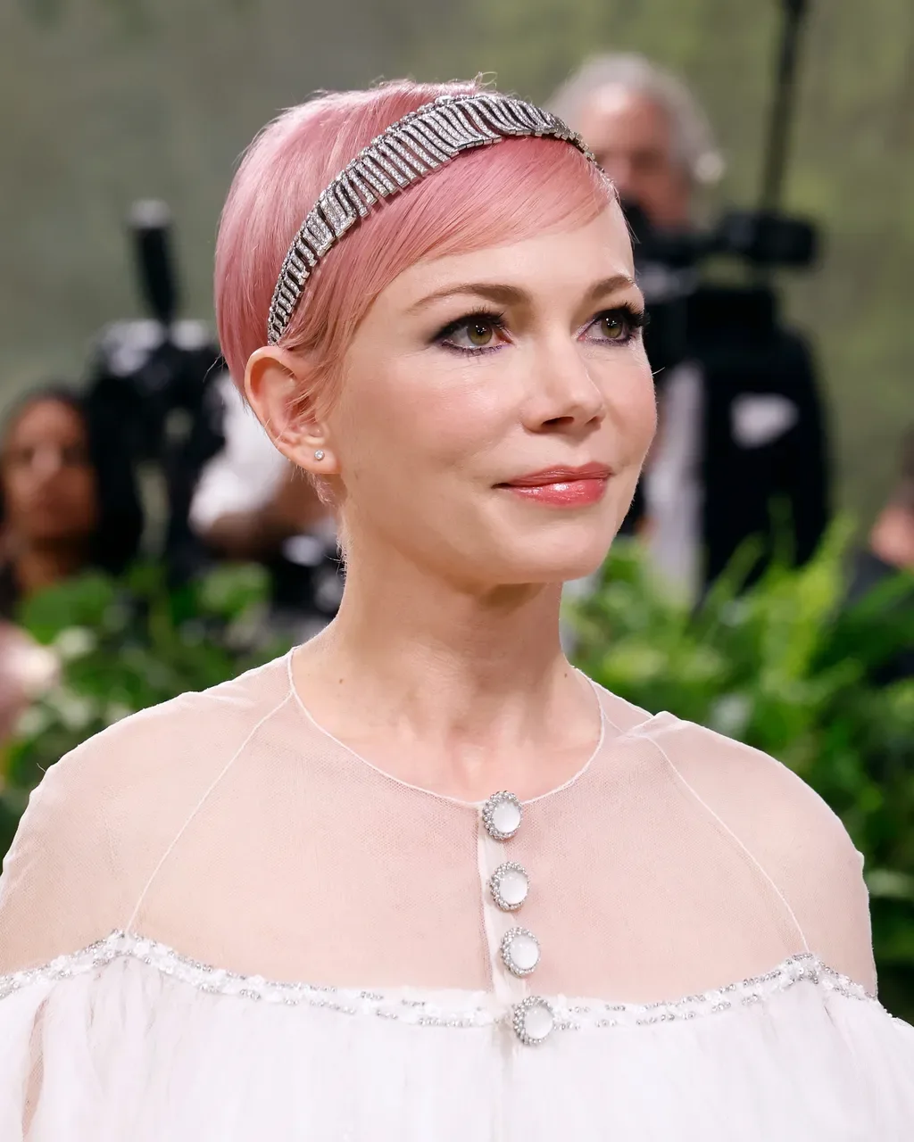 ear straight chestnut pixie with side swept fringe shown as a headband hairstyles idea