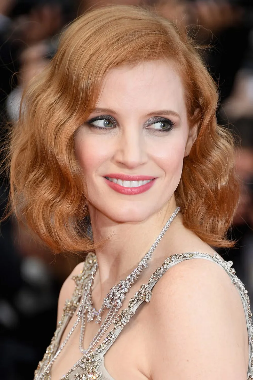 shoulder wavy copper color shown as a hollywood waves idea