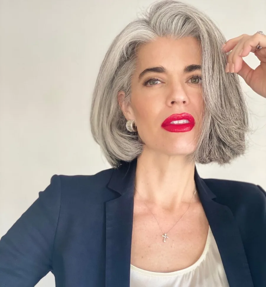 Older woman with a chic silver rounded bob