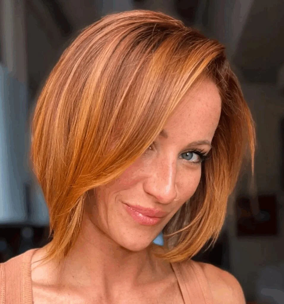 Copper side-part lob haircut with smooth volume for thin hair
