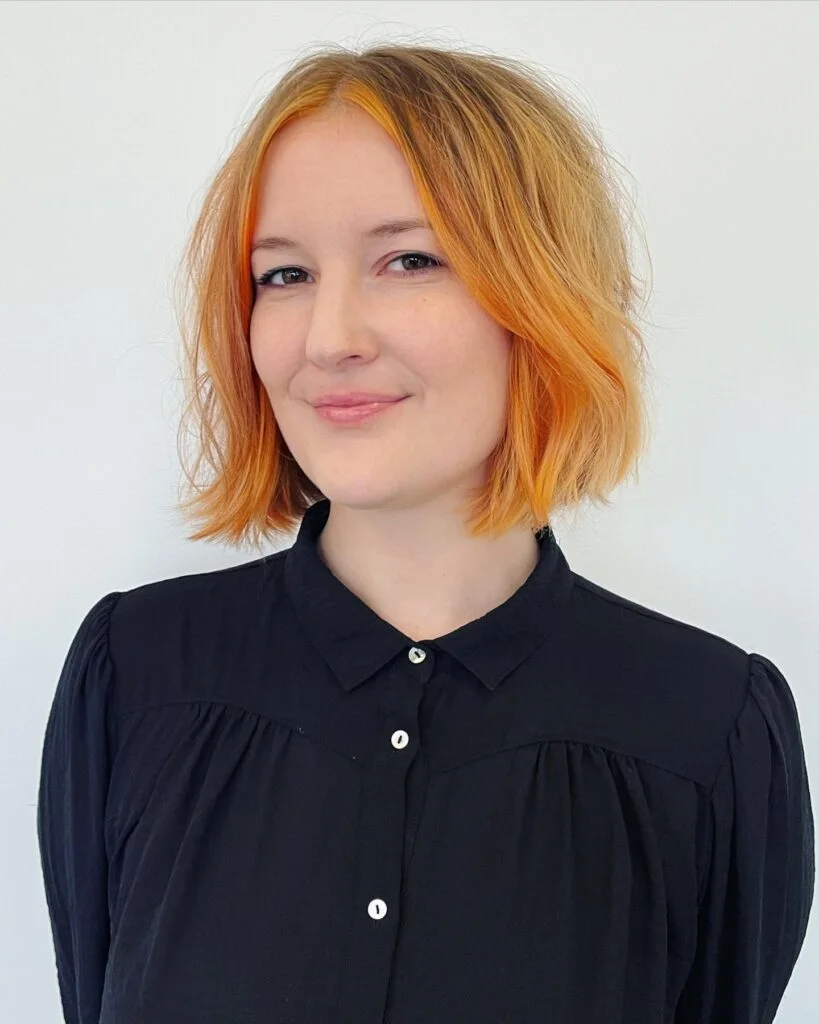 Orange blonde blunt lob haircut with clean ends for thin hair