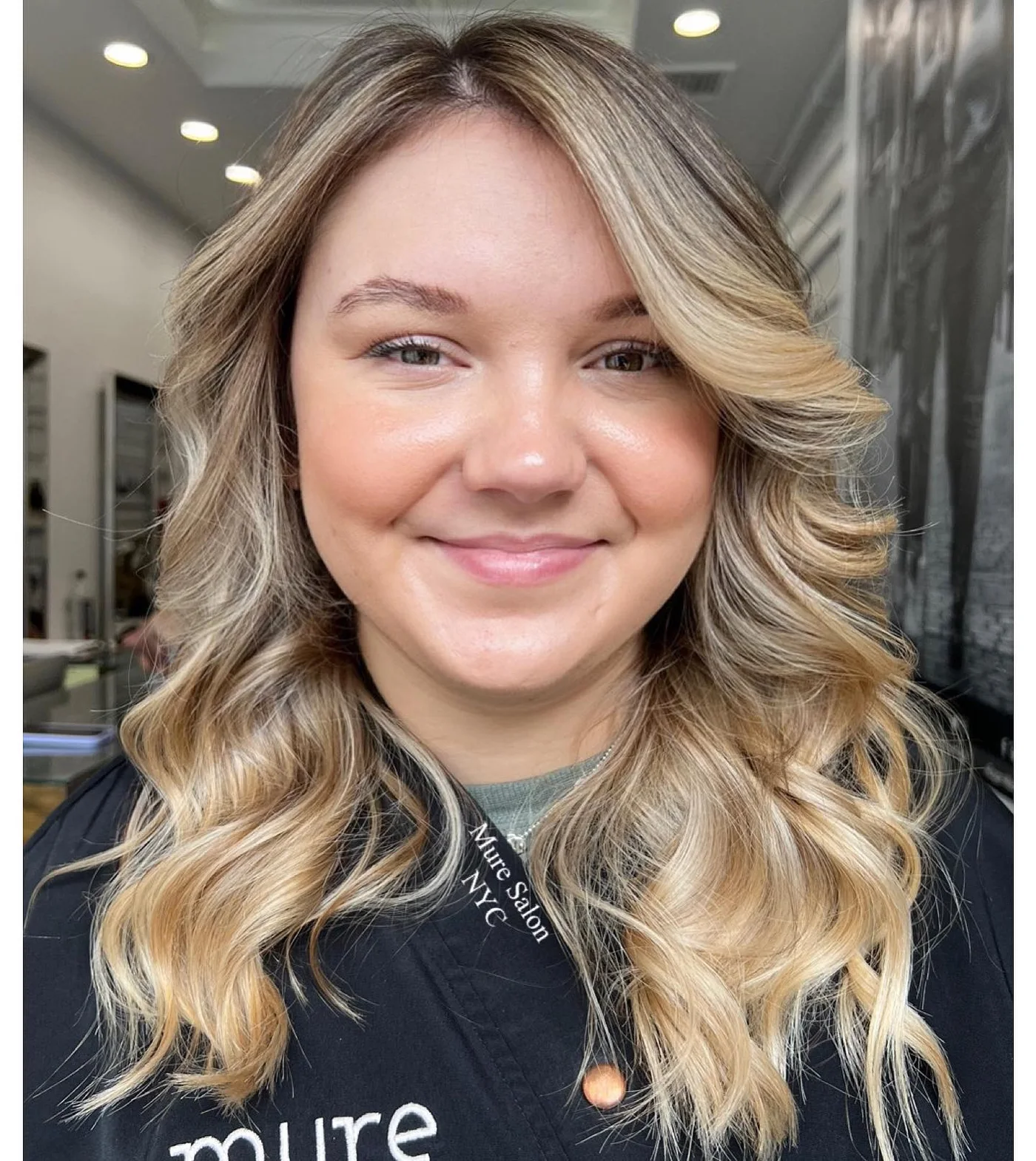 Highlighted wavy lob haircut with soft volume for thin hair