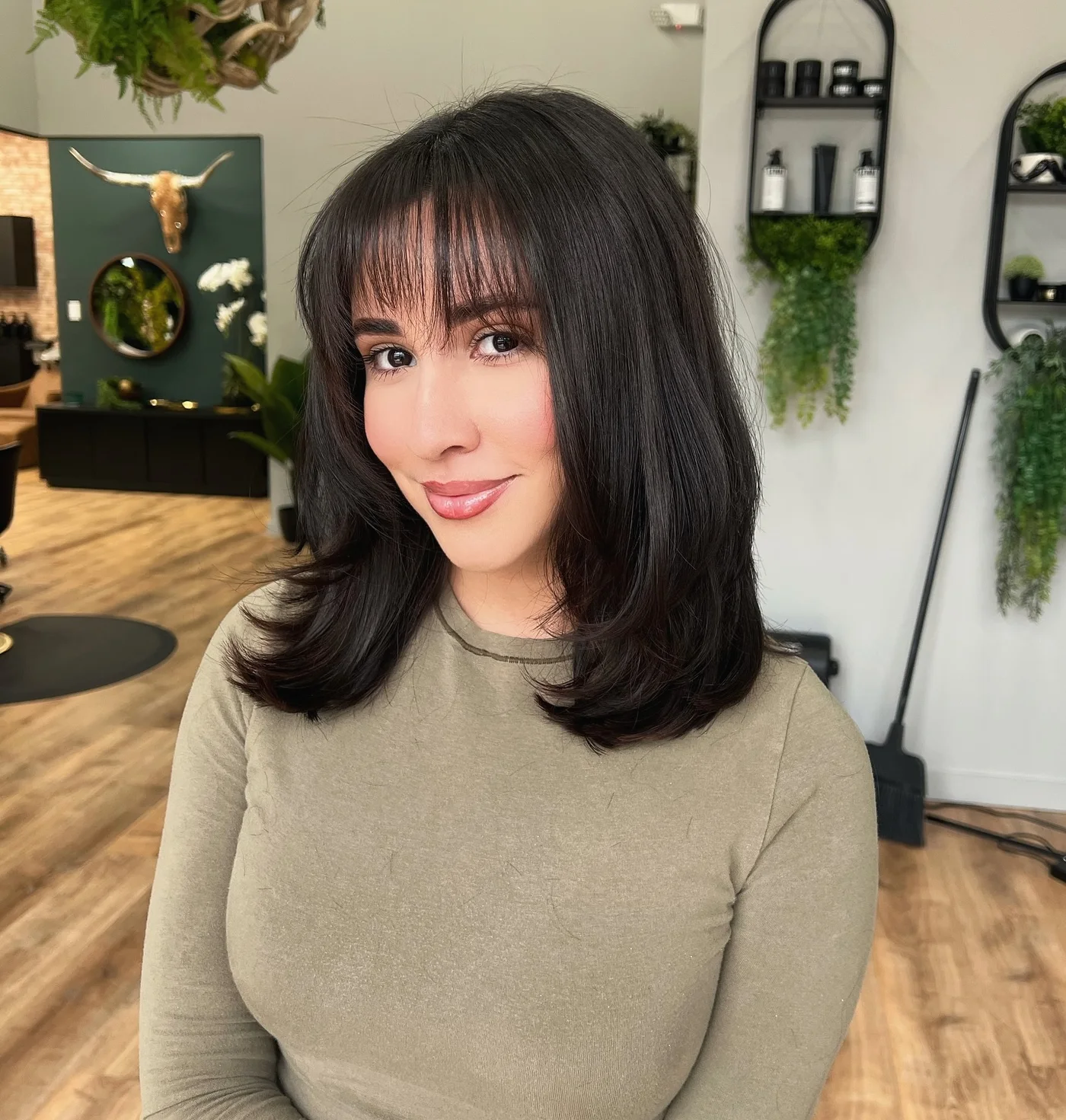 Black blunt lob with bangs and full shoulder length shape for thin hair