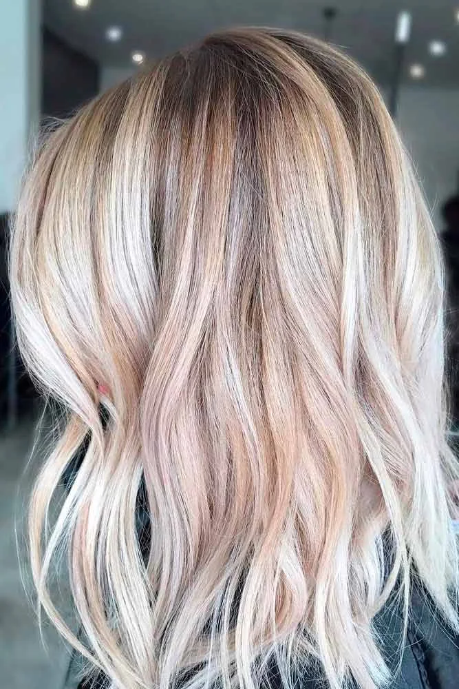 Back view of a light long bob with soft waves and darker upper sections