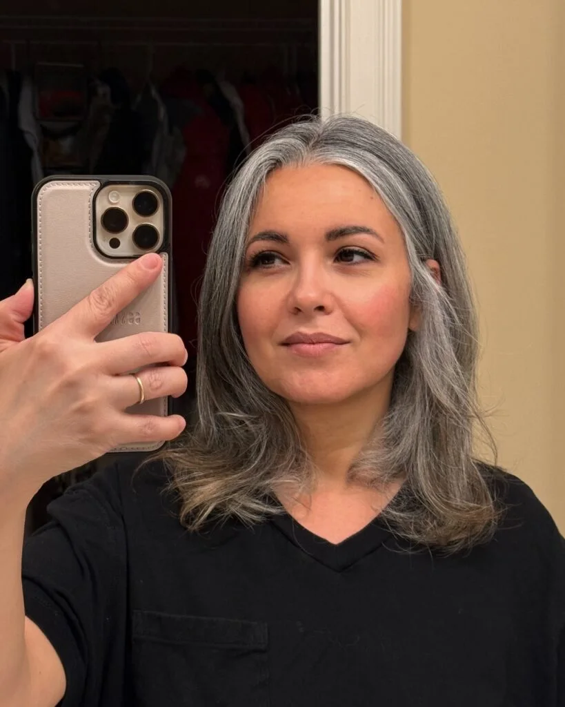 Silver medium length haircut with soft layers and a smooth natural finish for thin fine hair