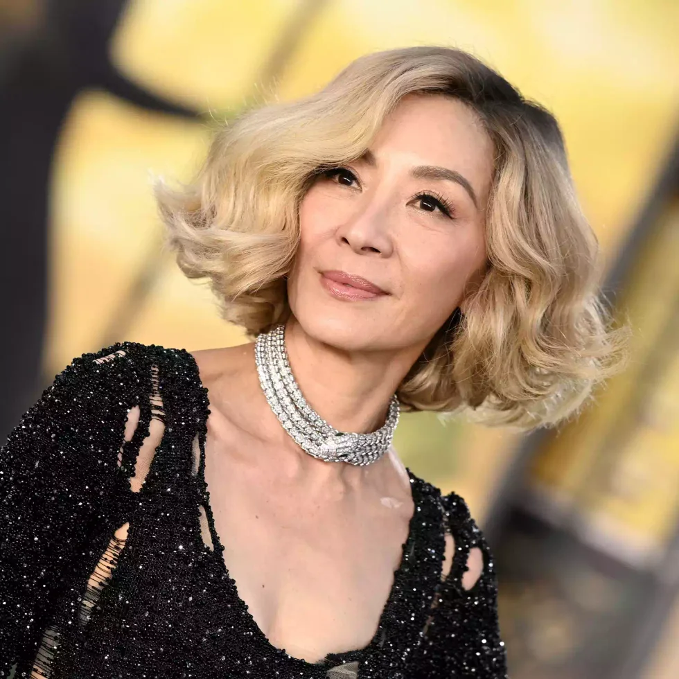 Blonde rounded layered bob with thick hair movement