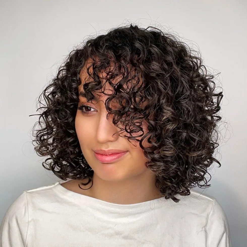 Curly medium bob with rounded shape for thick hair