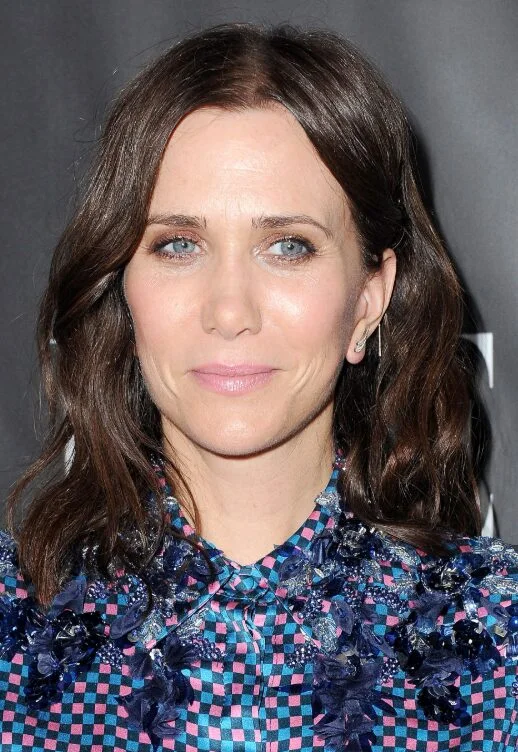 Soft brunette wavy lob with thick hair movement