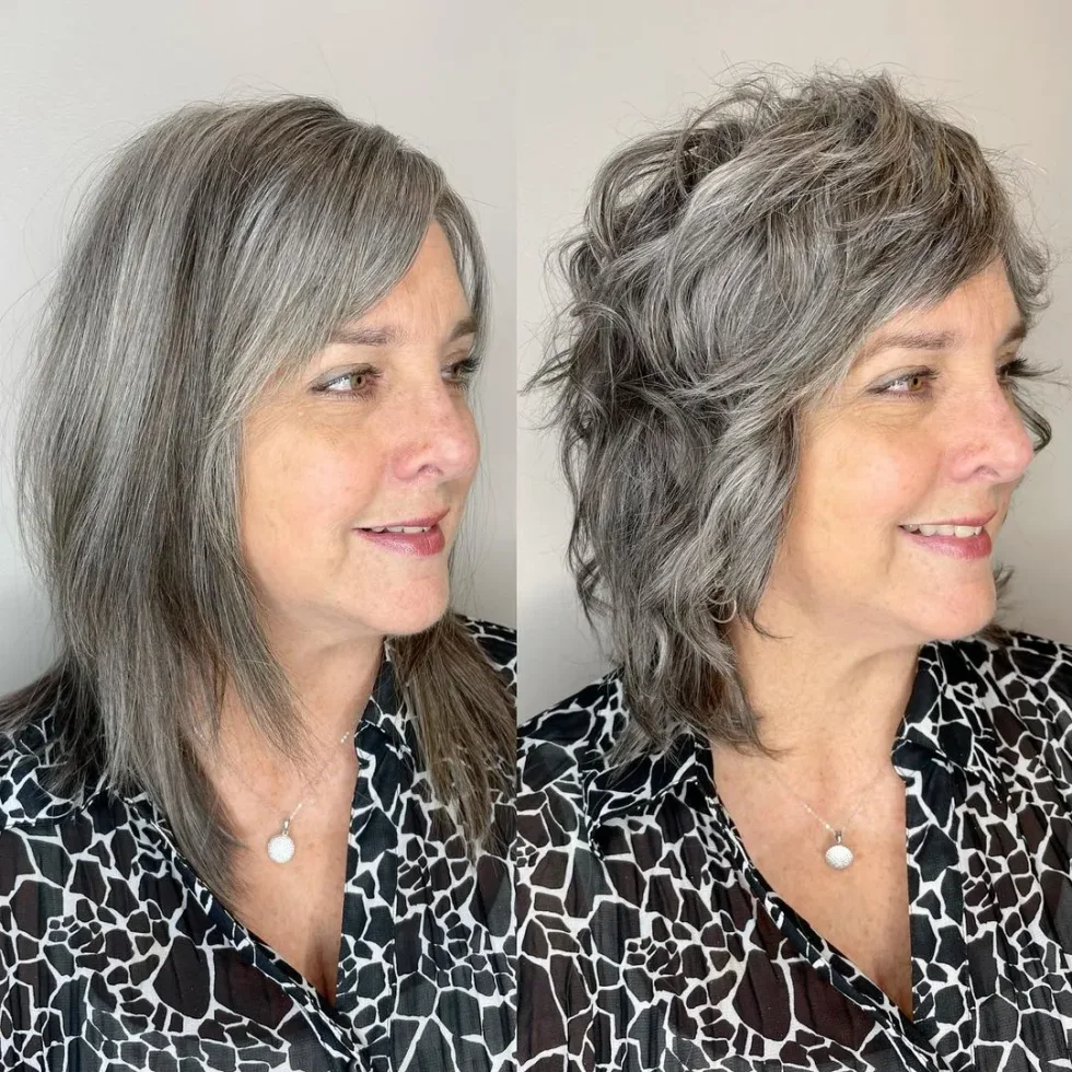 shoulder wavy silver shag with curtain fringe shown as a messy haircuts for women over 60 idea, featuring curtain fringe